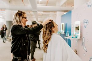 Some booths provided tips for businesswomen who want to look their best. (Photo by Bekah Linder)
