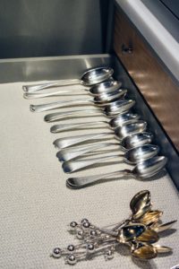 These spoons are organized by size and style - notice how similar they are, but none are exactly the same.