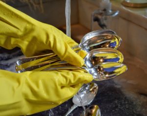 After cleaning with the silver cream, Enma washes the spoons with water and dish soap to ensure all the cream is removed. These spoons look very shiny.