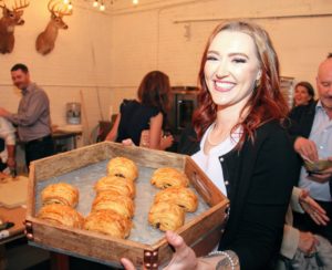 Haley Scott is head baker from Ross Bread + Coffee in Ridgefield, Connecticut. Here she is serving warm pain au chocolate. https://rossbread.com/ (Photo provided by Unger Media for Mike's Organic)