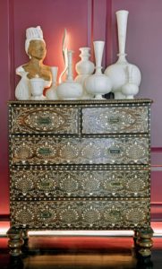 In his room, Vicente Wolf incorporates this inlaid chest from India with marble accessories and a 1940s "Mother Nature" bust from his VW Home collection. (Photo by Vicente Wolf)