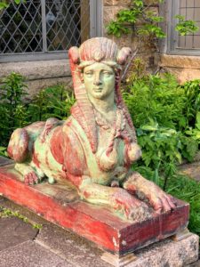 This is one of a pair of enameled terra-cotta sphinxes designed by Emile Muller. I keep them out during the warmer months to "guard" the entrance to the house.
