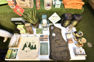 Here is a table filled with other curated items from DICK'S Sporting Goods for all your summer camping excursions. (Photo by Eugene Gologursky/Getty Images for Macy's, Inc.)