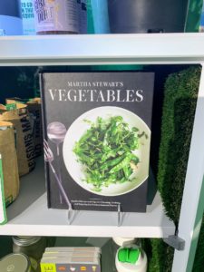 On this shelf, my book, "Martha Stewart's Vegetables: Inspired Recipes and Tips for Choosing, Cooking, and Enjoying the Freshest Seasonal Flavors".