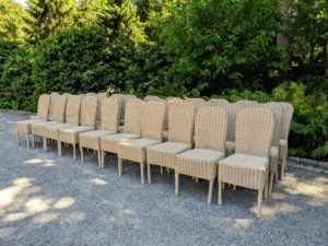 Outside, chairs are pulled, counted and set up to be checked and cleaned. These are some of my favorite wicker chairs. Care must be used whenever transporting delicate furniture - never drag, always pick up.