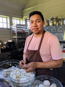 Chef Aron Cutuc, our head chef for this event, is in the Flower Room peeling all the garlic - another part of our "mis en place" process.