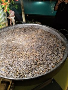 There was a rice station with paella negra, a dish that originated in Valencia, Spain. It is composed of rice, squid, and lots of squid or cuttlefish ink.