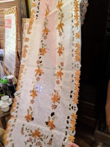 The embroidery is so detailed in this table runner.