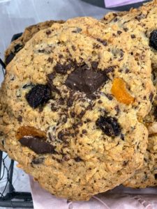 These are the giant kitchen-sink cookies. These have dried fruit, toasted nuts, chocolate, oats, and coconut. I served them recently for a group of friends and they devoured them.