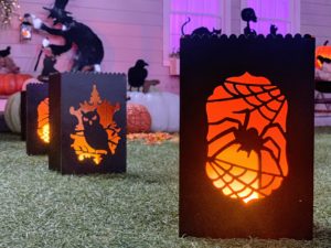 Here is a closer look at the luminaries. I have two styles - an owl and a spider in its web. Both work with several different candle modes - flame, steady, flash and, fade.