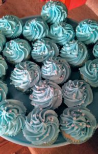 And blue frosted mini cupcakes.