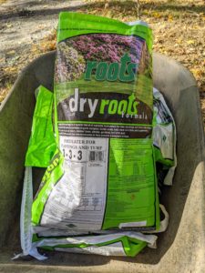Always have a good quality tree fertilizer on hand to mix with the soil. We use dryroots, a natural granular fertilizer with nitrogen, potassium sulfate, iron, magnesium, kelp meal, vitamins, and humic acids to improve soil and plant health.