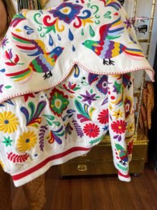 Afterward, we had just enough time to do a little shopping. We stopped at Vintage by Misty, which carries a curated collection of vintage designer clothing, jewelry, and accessories from around the world. We all admired this colorful jacket with birds and flowers.