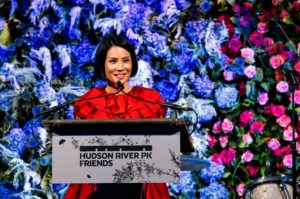 Honoree Lucy Liu also took to the stage. Behind her is a "four seasons wall" featuring flowers in the colors of winter, spring summer and fall. (Photo by Jamie McCarthy/Getty Images)