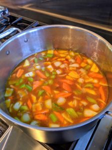 Look at the vibrant colors of all the fresh vegetables. They will be served with the Couscous Royale. Here are the vegetables as they simmer in the broth.