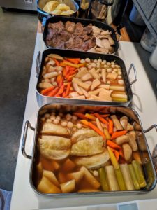 By afternoon, all the vegetables and meats are cooked and placed into pans with the broth. This is when everything can be seasoned with salt and pepper. They will all be brought up to my Winter House kitchen shortly before serving, warmed and then plated together. You will love the finished dishes.