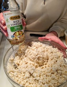 Making prepared horseradish is so easy. Once processed, move the horseradish into a bowl and add rice vinegar, or white vinegar. For about a cup of horseradish, add about 3/4-cup vinegar. Homemade prepared horseradish is about twice as strong as store-bought versions and can last several weeks in the refrigerator.