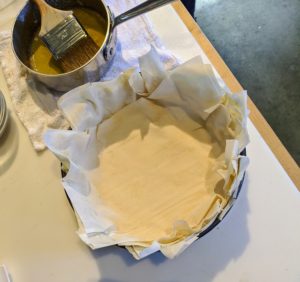 In all, there are 16-layers of phyllo in the pan.