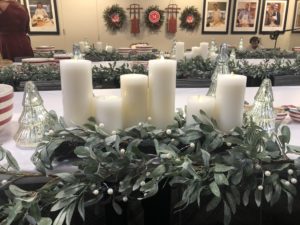 The entire room was decorated with holiday-themed pieces from my Collection at Macy's. This is my Silverwoods Mistletoe Candleholder Centerpiece and Garland. We also used my flameless candles in white.