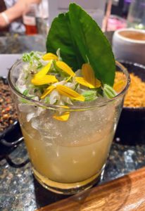 This is my favorite. Matt did not have a name for it because he made it on the spot, but it has rhubarb-infused Saint Germain, white guava-infused vodka, kaffir, lime leaves, calamondin, yuzu, Meyer lemon, lime, and agave with white borage on top.