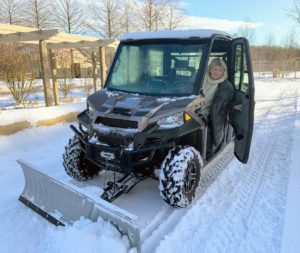 I love our Polaris vehicles. This Polaris XP Ranger 1000 has 80 horsepower – one of the most powerful in its class. It is easy to handle and helps with so many of the chores around the farm. Here I am about to plow the four miles of carriage roads - so much fun!
