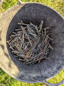 All the nails are kept in a bucket - any nails that are still usable are saved.