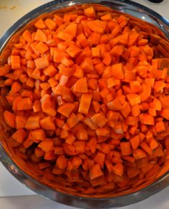 Look at this bowl of bright orange carrots. All my food is completely organic and full of flavor.