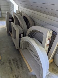 Everything is kept off the floor. These window casings, already painted in my signature Bedford Gray, are sitting on a wood base. It is crucial that any stored wood be kept free from dampness.