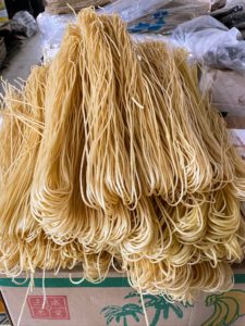 Most noodles in the markets are hand-pulled and sold dried. Asian noodles can be made with rice, yam, and mung bean in addition to wheat flour. Noodle lengths also have a significance—they are often symbols of longevity and served at celebratory meals.
