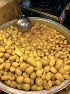 This is a cauldron of potatoes boiling in oil - these were so good.