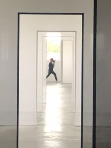 Here's a photo of my friend, Douglas Friedman, in the space. He is a very talented photographer - follow him on Instagram @DouglasFriedman. Using floor-to-ceiling-length “walls” of translucent white and black scrim, as well as window-tinting film, Irwin created a changing experience of light and space. (Photo by @seenbysharkey)