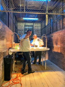 I took this photo of Michael preparing the dishes from the freight elevator.
