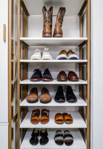 They created ample space for all their personal items including this entire shelf for shoes. (Photo by Andy Frame, andyframe.com)