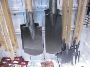 A closeup of the solidly forged Boron steel heads of the Digging Spade, Transplant Spade, and Perennial Fork
