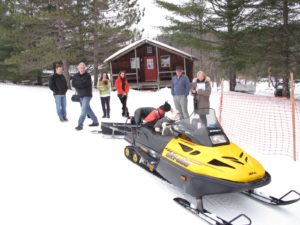 Here I am with Robin, Bobby, and their friends - Chuck and Linda - we are discussing the art of grooming trails with Rob MacGregor, who works at Viking Nordic.