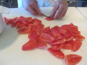 Pierre blanched these plum tomatoes to remove their skins.  They are neatly cut and seeds discarded.