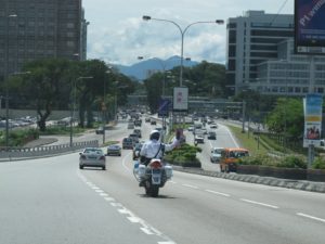 Our fearless police escort, Mr. Abu Bakar - in Malaysia, they call these escorts 'outriders' - we all wanted to take him home to NYC to negotiate traffic for us.
