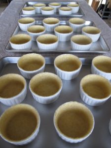 The souflee dishes buttered and sugared with Demerara sugar