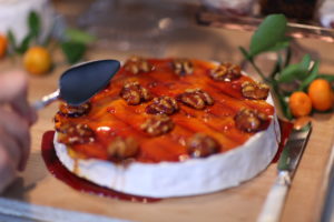 A caramel-topped wheel of Camembert