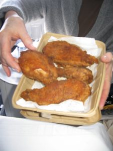 I brought freshly made fried chicken (Emeril's recipe) on the plane - we really enjoyed it!