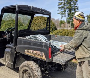 This is our Polaris Ranger EV 4x4, a very handy, smooth and quiet electric vehicle. All the Polaris Rangers get a lot of use around my farm. Chhiring carefully places all the pieces in the back and takes them to the specified storage area.