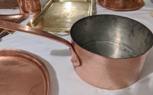 And then wipe the piece thoroughly with a soft cloth and see how it shines. Never place any copper in the dishwasher. The detergents’ aggressive chemicals, combined with the washer’s high cleaning temperature, will eventually cause any copper surfaces to dull, so hand-wash all copper mugs, pots, and pans instead.