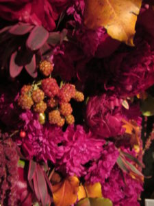 Clusters of berries mixed in with the arrangements