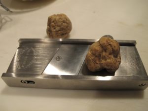 Two magnificent white truffles on my prized truffle slicer - you can find a similar one at J.B. Prince Company in NYC. www.jbprince.com