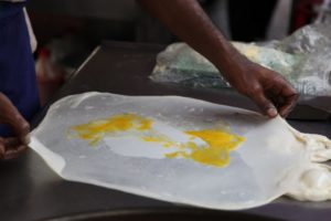 You can also crack a raw egg onto the thin dough.