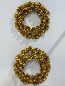 These Metal Floral Wreaths are so well-constructed - everything is soldered right on the metal frame. Place it on a wall or even flat on the table with a candle in the center.