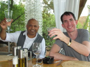 Ravi Naidoo, our host at Design Indaba and Kevin, toasting our arrival at Singita.  Ravi had to fly right back to Capetown to get on with preparations for the week-long conference on design for better living.