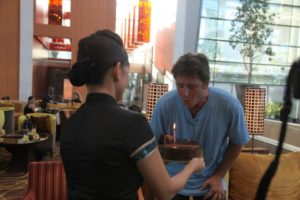 After touring the SkyPark, we celebrated Gary's birthday in the lobby with a delicious chocolate cake.