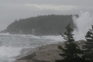This view is looking towards Otter Cliffs, with the splash rising up and over the closed roadway.