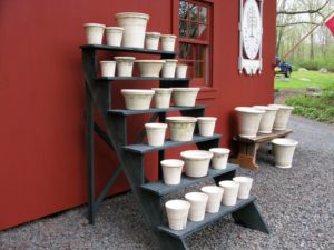 A collection of white pots